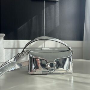 Compact Silver Shoulder Bag with Reflective Finish